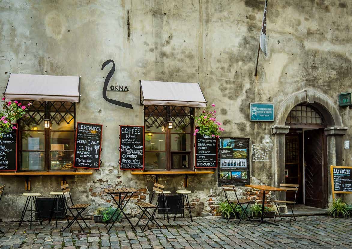 A cobbled street between historic European facades